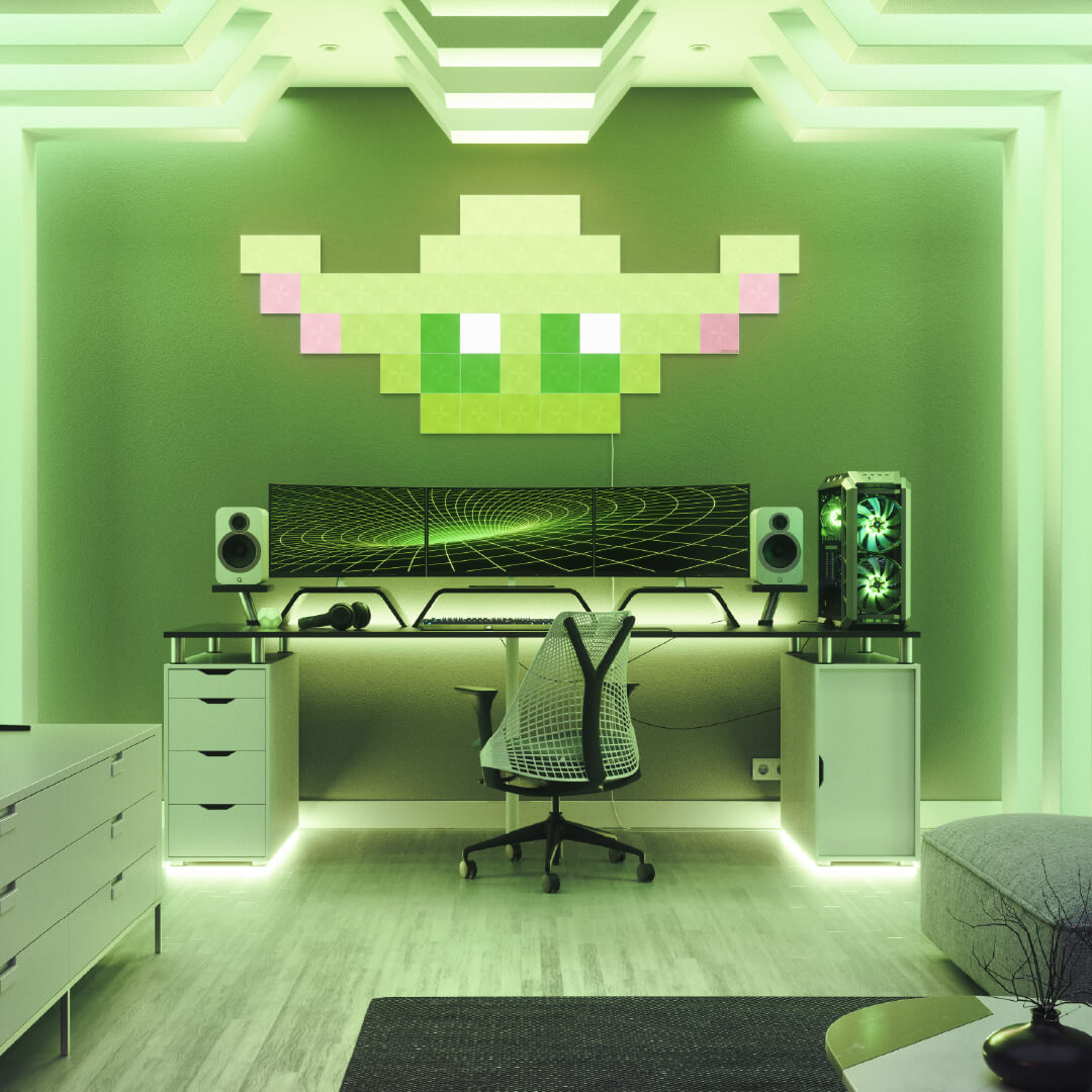 Nanoleaf Canvas color changing square smart modular light panels mounted to a wall above a battlestation. Similar to Philips Hue, Lifx. HomeKit, Google Assistant, Amazon Alexa, IFTTT.